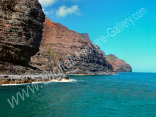 Three Finger Falls next to Sea Cave by Honopu, Na Pali, Kauai, Hawaii