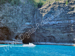 Waiahuakua Sea Cave, or Pirate's Double Door Cave, and Falls, Na Pali, Kauai