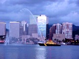 Fireboat and Honolulu Harbor Skyline